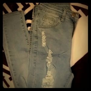 Ripped petite skinny jeans